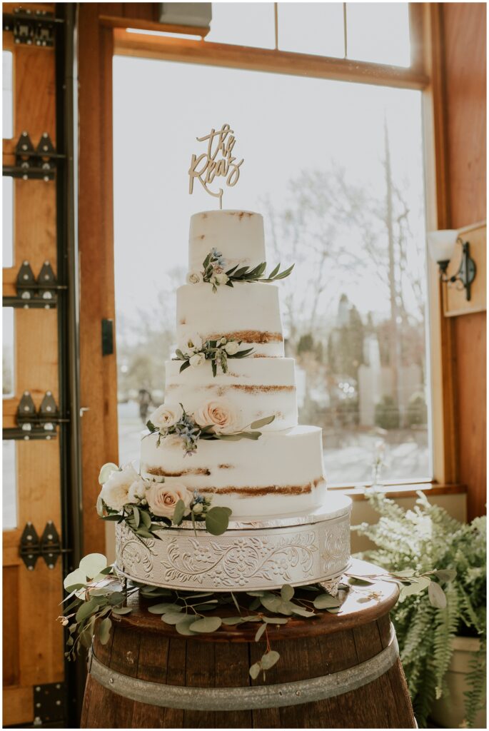 White Wedding Cake with Pastel Florals | Photos by Sydney Madison Creative