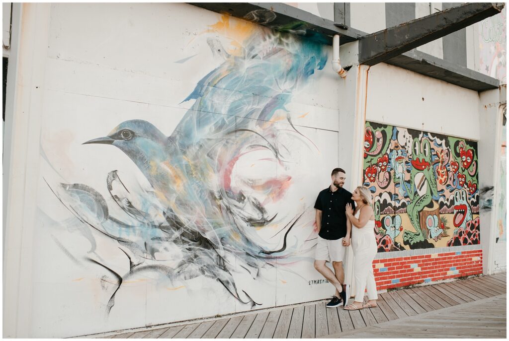 Asbury Boardwalk Mural Engagement Photography Session by Sydney Madison Creative